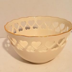 Lenox china heart bowl is hand decorated with 24 karat gold trim
